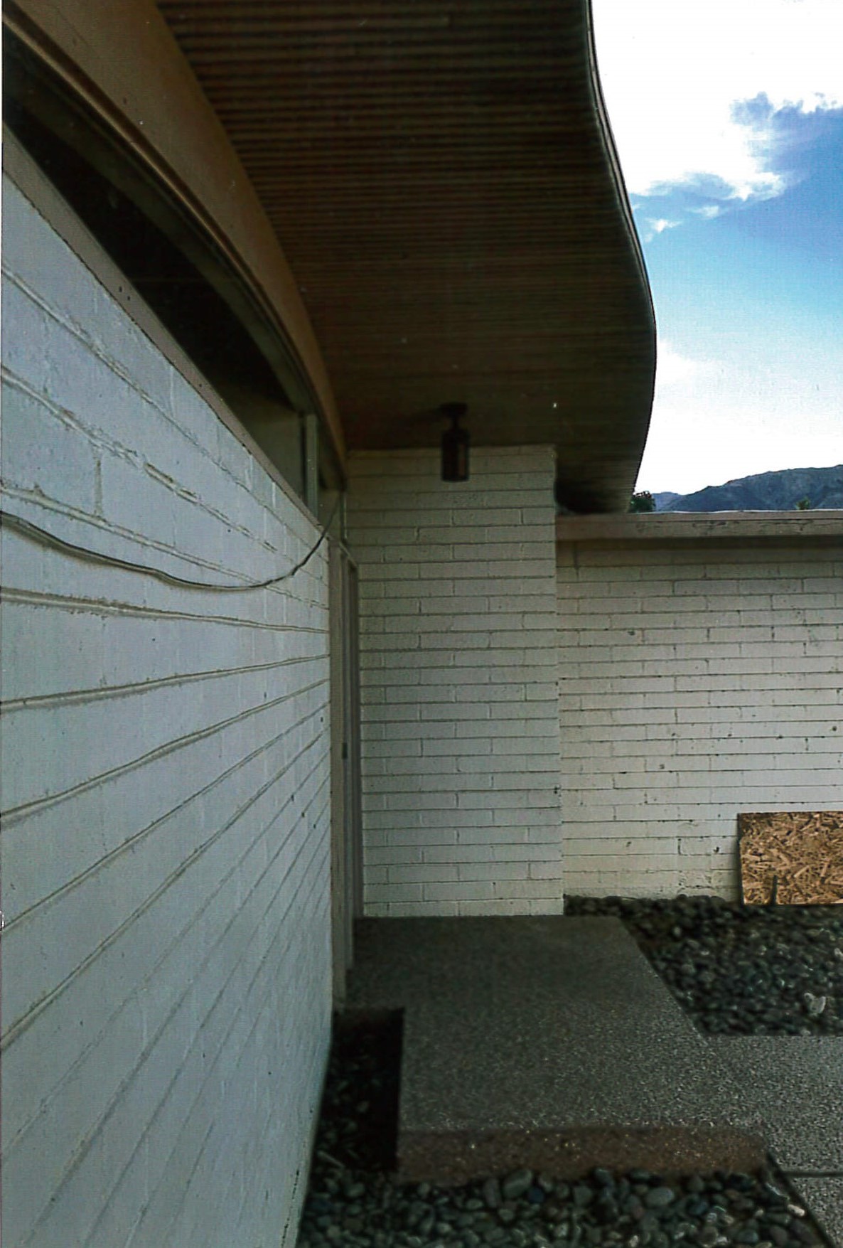 Profile view of front entry, view of non-original addition